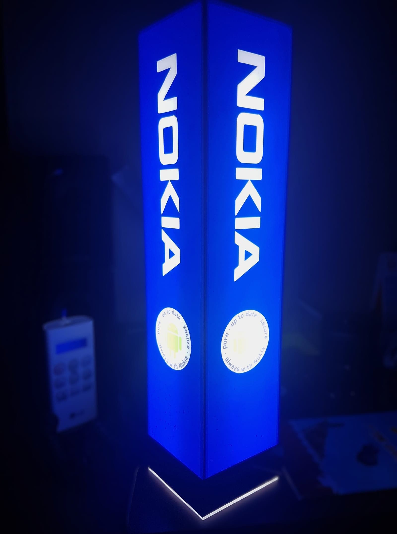 Illuminated Nokia branded counter display column