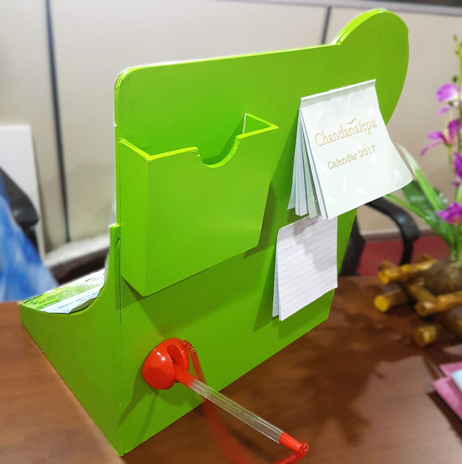 Green acrylic counter-top brochure and calendar holder