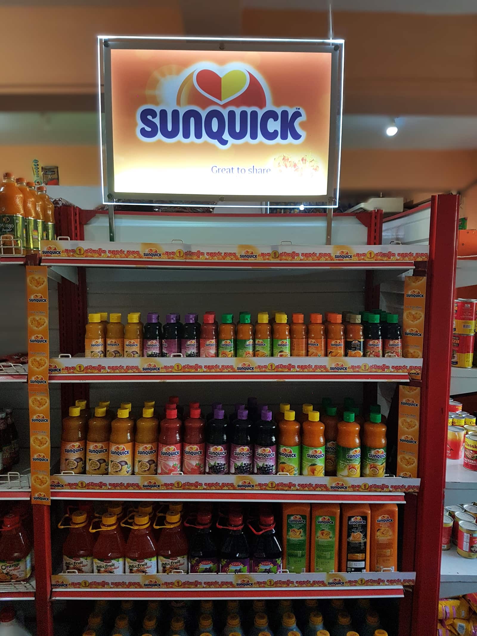 Sunquick branded product shelving in a supermarket