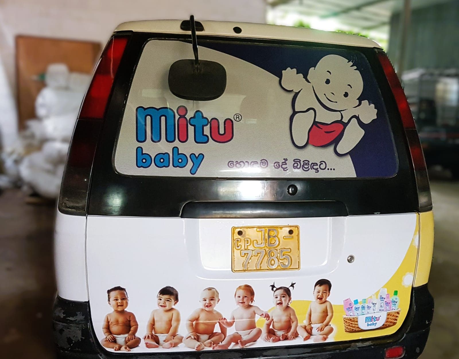 Mitu Baby branded van, printed rear door graphic