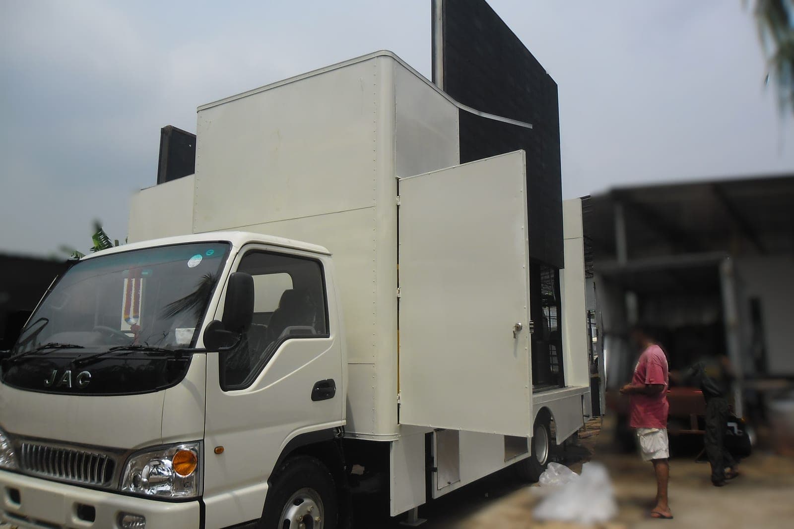 Mobile LED advertising truck with the side screen panels closed
